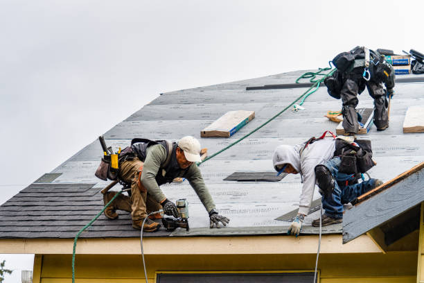 Professional Gutter Installation technician working in Chapman, KS